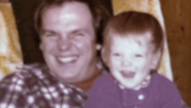 Close-up of a father and toddler daughter, circa early 1980s