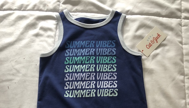 Navy blue child's body suit featuring the words "Summer Vibes"