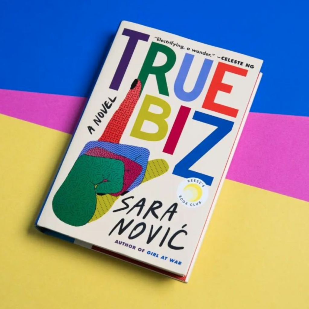 The novel True Biz, against a blue, pink, and yellow background
