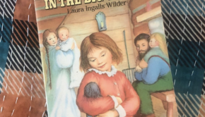 Section of book cover of Little House in the Big Woods