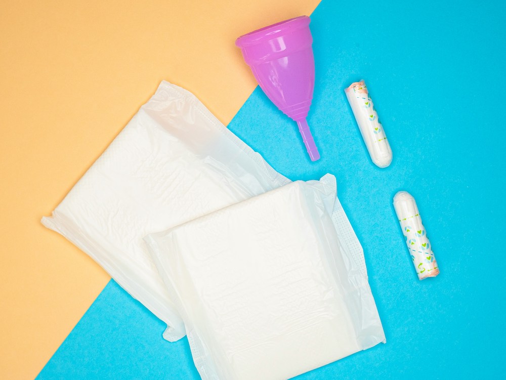 Period supplies against a multi-colored background
