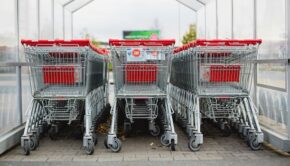 Shopping carts lined up outside a store