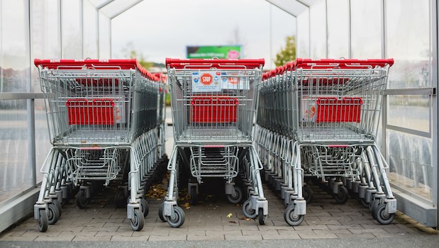 Shopping carts lined up outside a store