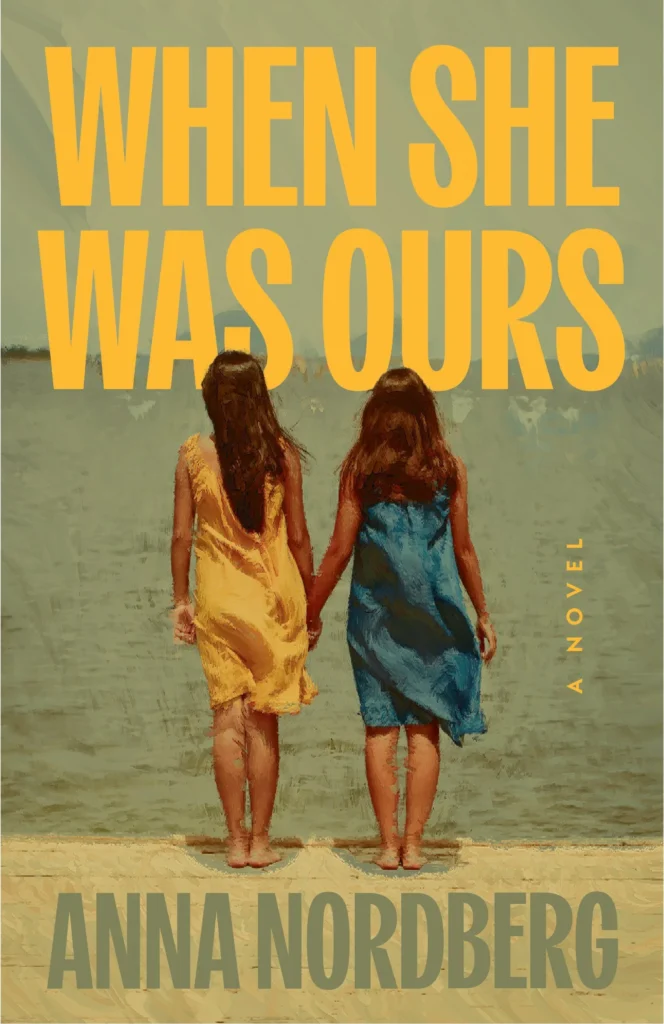 Book Cover of When She Was Ours by Anna Nordberg, featuring a realistic painting of two young women, seen from the back. They both wear dresses and have long brown hair.