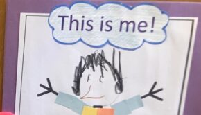 A child's drawing of a person with a bubble that says "This is me!"